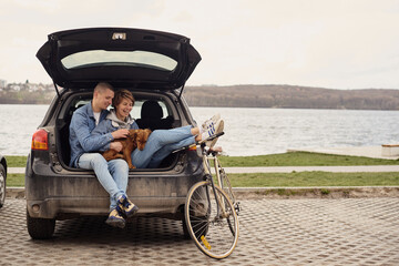 Young couple sitting in the car