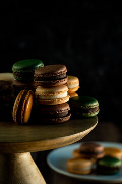 macaroons on wood cake stand