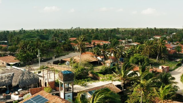 brazil atins summer vaction holiday huts camp aerial view overview palms 4k