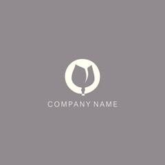 Simple, minimalistic, stylized tulip symbol or logo. Made with a spot in the form of a circle