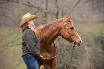 Fototapeta premium Cowgirl with horse