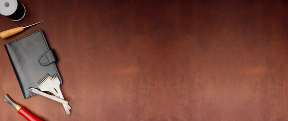 Composition of a leather background and tools for working with leather, banner