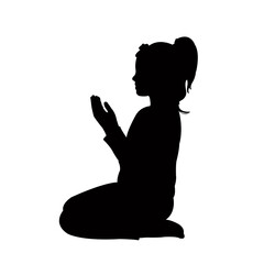 a girl praying, silhouette vector © turkishblue