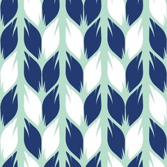 Seamless pattern of white and dark blue leaves on a light background