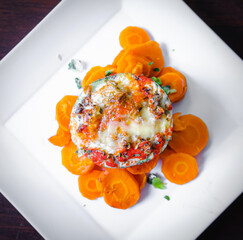 Healthy foods, full of vegetables and delicious flavors presented in white plate with colorful background