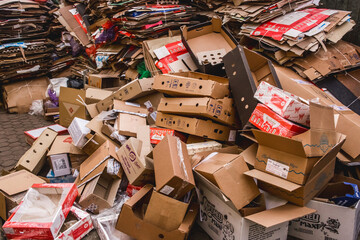 Belarus, Minsk Region - December 13, 2019: Waste packed cardboard boxes, waste and recycling paper garbage