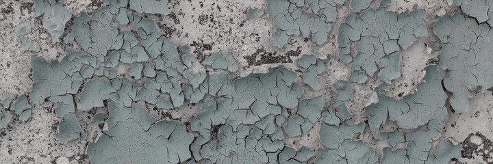 Peeling paint on the wall. Panorama of a concrete wall with old cracked flaking paint. Weathered...