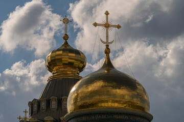 Fototapeta na wymiar Crosses on the domes of an Orthodox church.