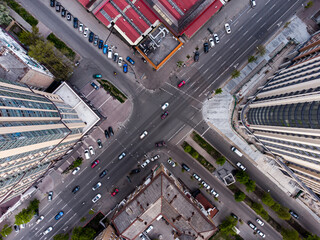 Diagonal intersection with cars in busy city life