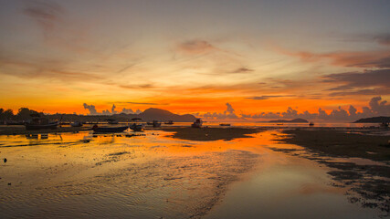 red sunrise over sea footage. Nature image High quality footage. Scene of Colorful romantic sky sunrise the sky background. beautiful sky at sunrise in nature and travel concept.