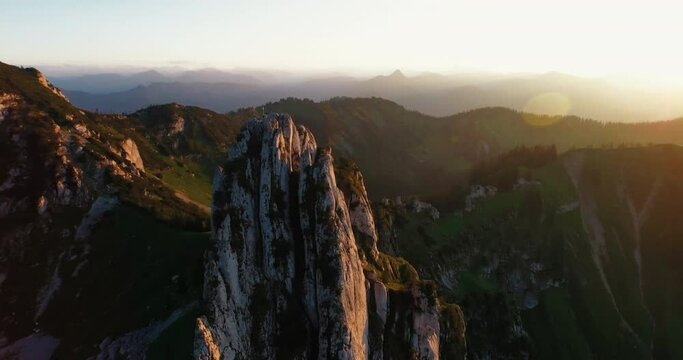 alps mountain peak aerial at sunset flyby austria panorama golden hour epic 4k