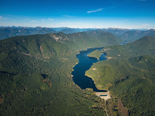 Stock aerial photo of the Coquitlam Lake Reservoir and mountains, Canada