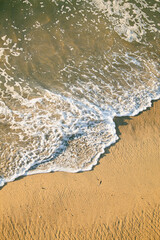 wave and sand on the beach 