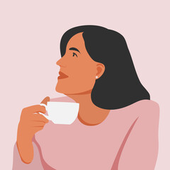 Beautiful young white woman enjoying a cup of coffee while relaxing at work. Portrait of a woman with a beautiful face and hair. Side view. Isolated on a pink background.