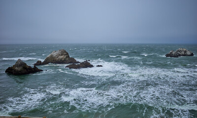 Fototapeta na wymiar Rocks in the sea Lands End