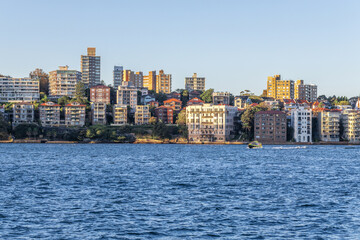 Fototapeta na wymiar Residential apartment buildings on Sydney Harbour NSW Australia 
