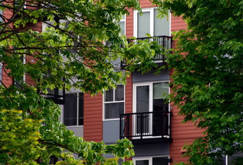 Window of red apartment building near Redmond way