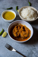 Rohu fish masala or curry, an Indian delicacy. Generally served with steamed rice and yellow pulses. Close up view.