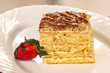 Sweet layered cake served strawberry