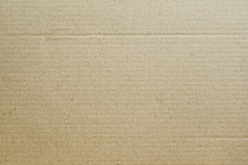 Cardboard texture, Paper box or packing paper, Brown horizontal corrugated and folded use for background, Close up
