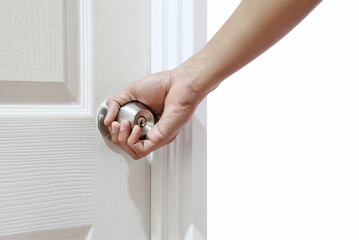 Man hand open door knob or opening white door