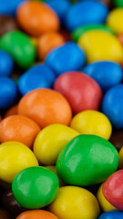 Fototapeta na wymiar Candy. Multicolored candy balls, close up. Assorted colorful chocolate candies