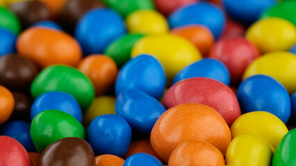 Multicolored candy balls, close up. Assorted colorful chocolate candies