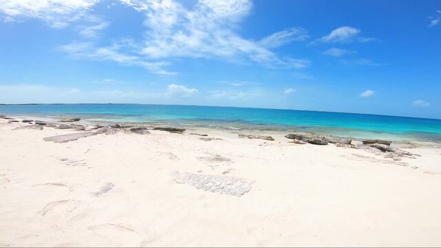 Great tropical beach scene  pan rigth  of The Shore beach white sand and blue sky
