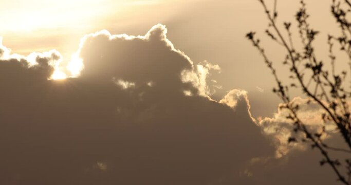Time-lapse of the clouds forming and emerging as the sunsets 