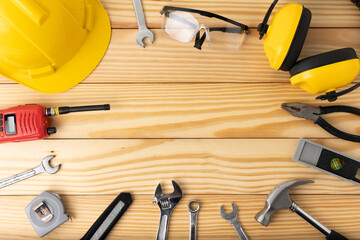 All tools supplies home construction on the wooden table background. Building tool repair...