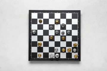 Game board with chess pieces on white background