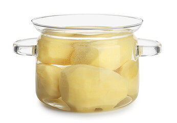 Cooking pot with peeled potatoes on white background