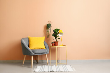 Interior of modern room with armchair and table