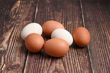 Fresh eggs from organic farms on wooden background.