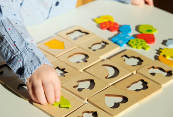 Sensory wooden blocks. Educational toys, Cognitive skills, Learn through play concept.