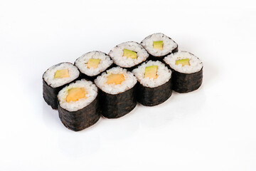 Sushi rolls with avocado. Isolated on white background. 