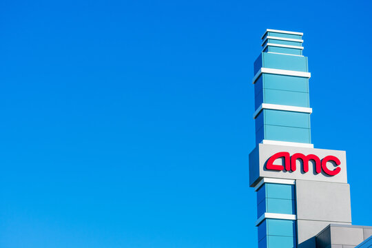 AMC signpost above the movie theater on a sunny day under blue sky - Sunnyvale, California, USA - 2021