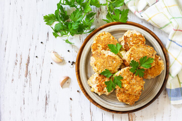 Healthy vegan food. Tasty homemade Red fish cutlets on a wooden rustic table. Top view, flat lay background. Copy space.