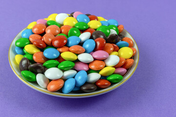 Round milk chocolate balls on a plate