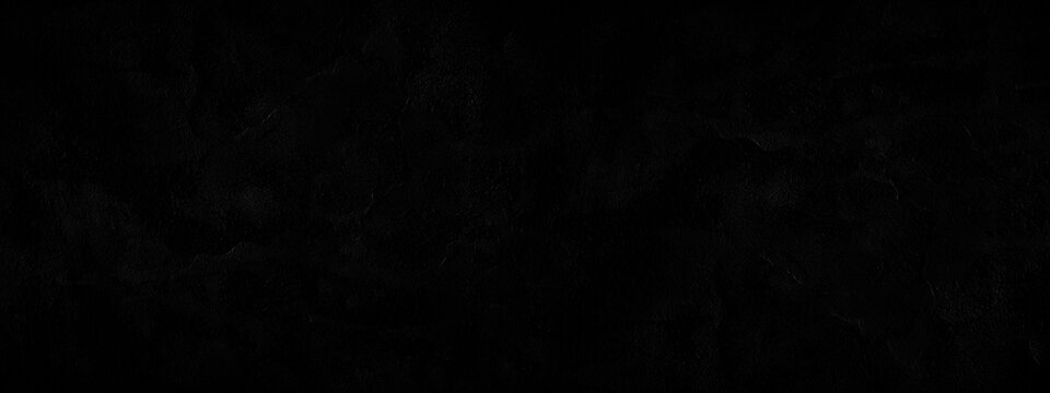 Black background. Dark abstract background with copy space for design. Wide banner.