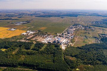 Obraz premium Forest and village in Ukraine, flight over the village of Klevan, view of the love tunnel from above.