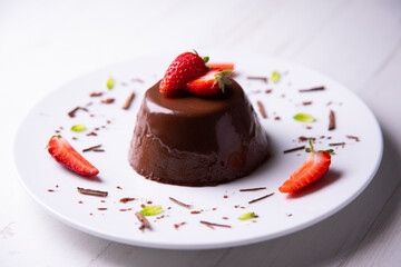 Chocolate pannacotta with strawberries.