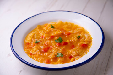 Menorcan soup. Traditional from the Balearic Islands, cooked with tomato, red pepper, cabbage, and bread.