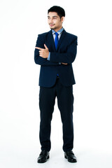 Portrait of cheerful young Asian businessman pointing finger to the side blank space isolated on white background. Studio shot, business and success concept.