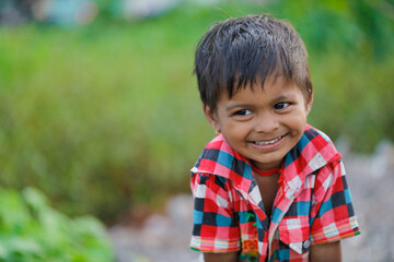 indian poor child playing at home