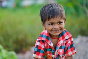 indian poor child playing at home