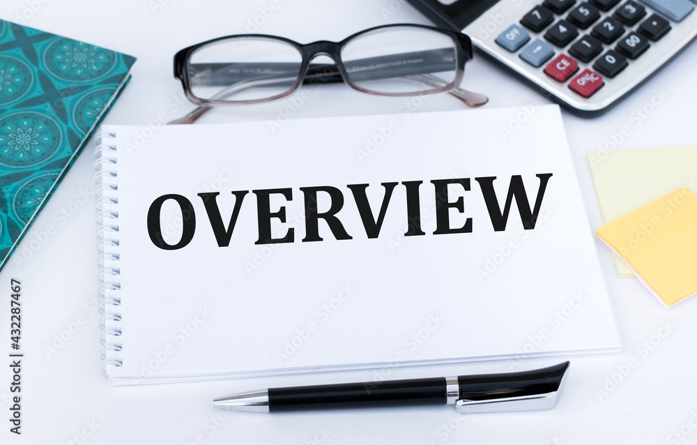 Poster calculator, glasses, note sheets and notepad with text overview on the white background