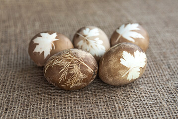 Painted Easter eggs on a burlap