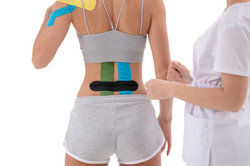 dynamic functional bandage with kinesio taping on the female back