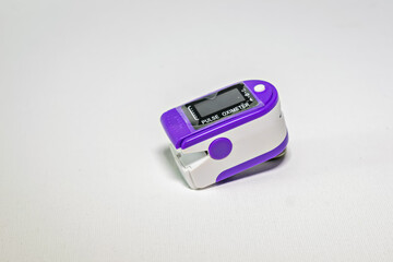 Pulse oximeter instrument used to check oxygen level.